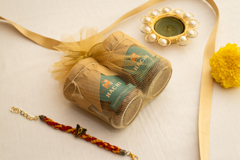 Classic Delight Rakhi hamper – 60gm twin granola bottles celebrating sibling love